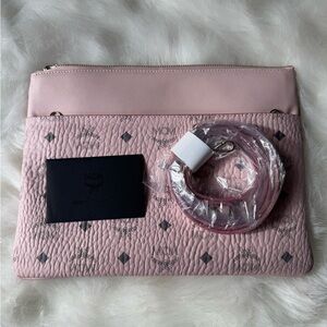 MCM Pink Clutch with Logo Pattern